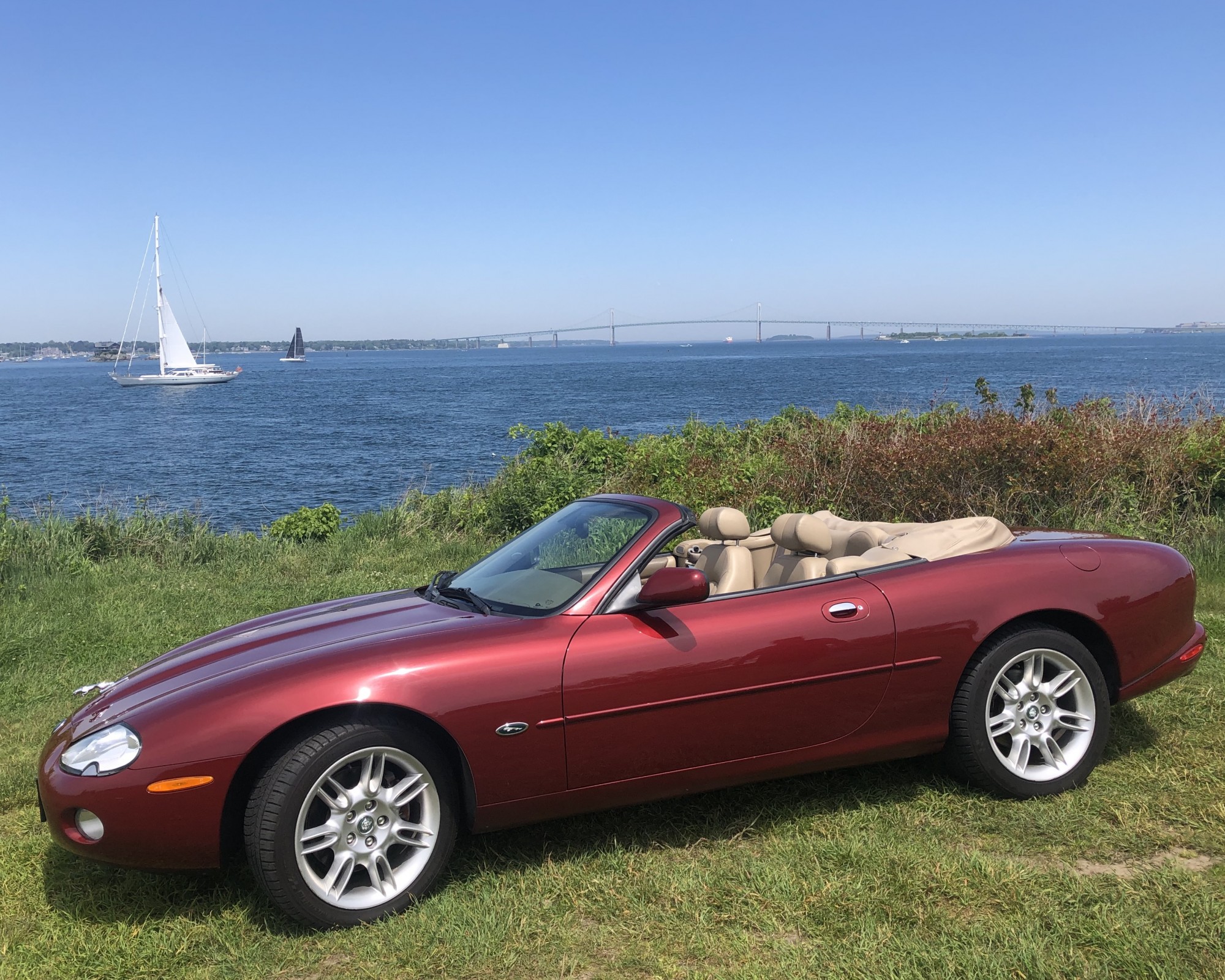 red jag by the water newport jaguar tours in a convertible